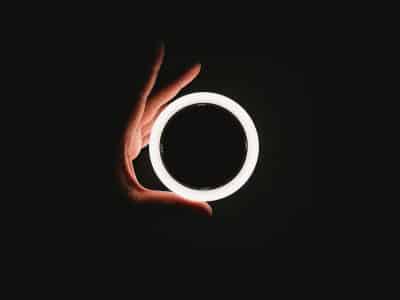person holding white ring light